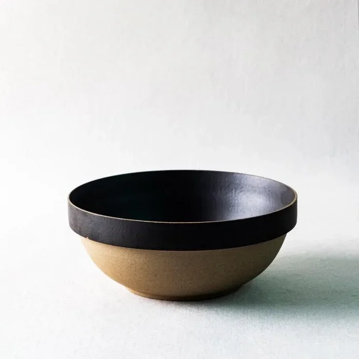 Black and White-Topped Stoneware Bowls With a Mostly Brown Exterior