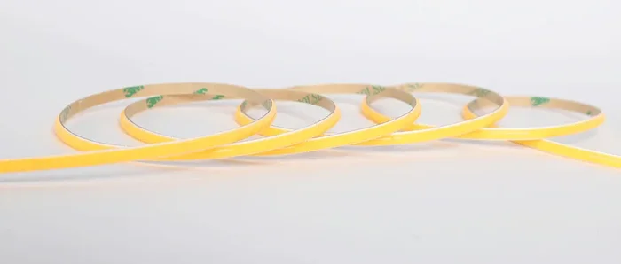 Lotus LED Lights COB LED Tape Flexible Strip Indoor 24V DC 2700K 1.5W Per Foot 120Lm Per Foot 16.4 Foot IP20 4Mm 90 CRI (LBL-COB-384-24V-4MM-27K-16FT-IP20)